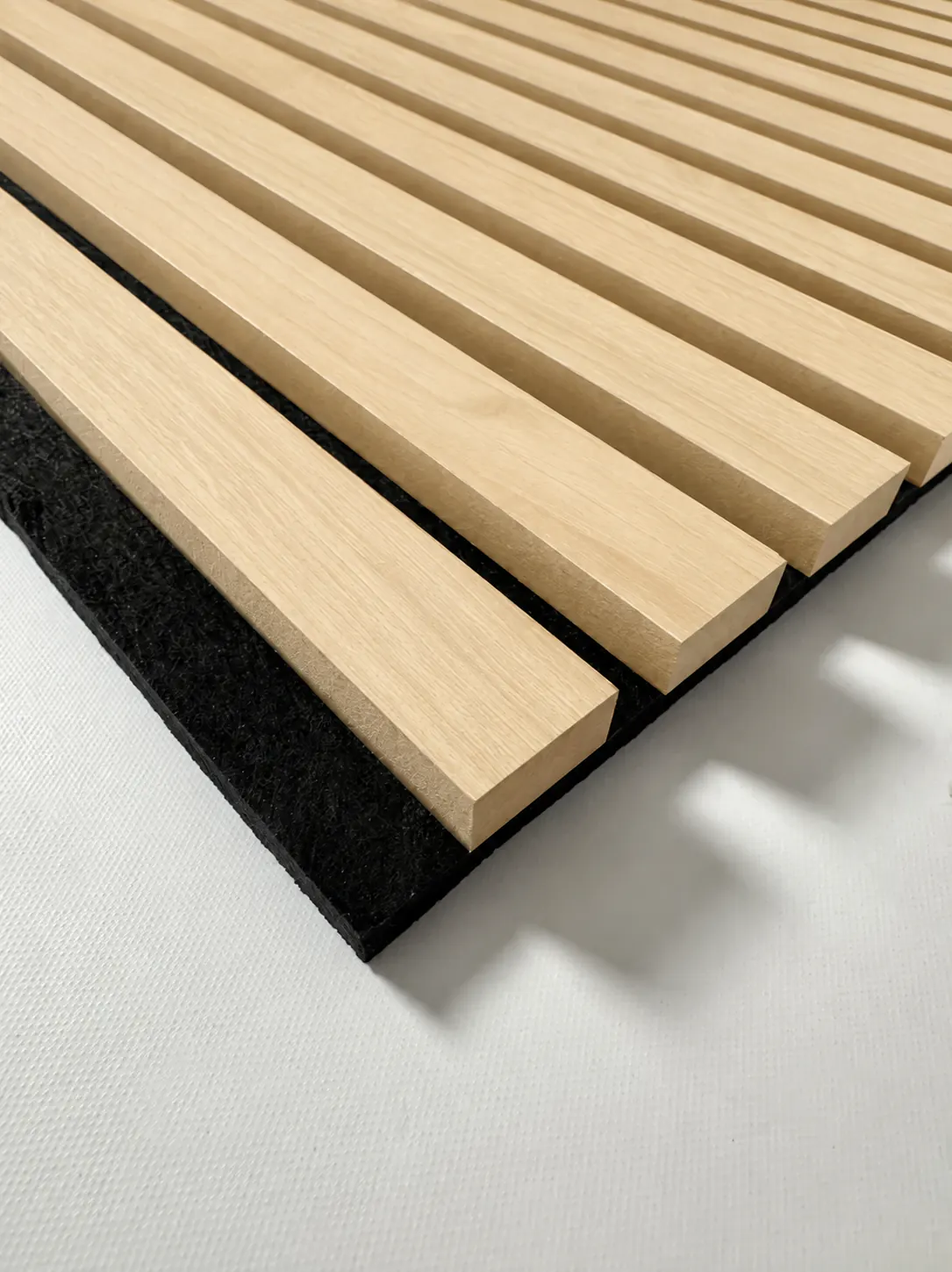 AcoustiSlat panel in the Fresno Mystic finish, showing the slats and the acoustic backing